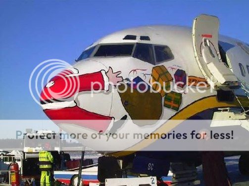 http://i1143.photobucket.com/albums/n627/thedogcody/funny-pic-christmas-santa-plane.jpg